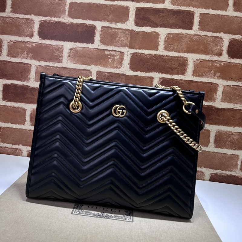 G*u*i top handle bags